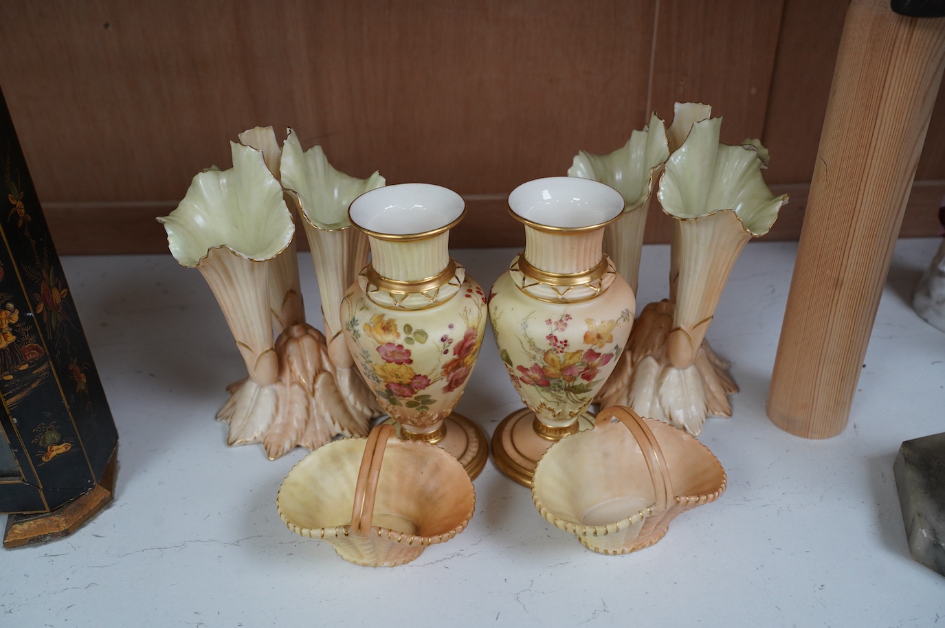 A pair of Worcester vases, shape number 1730, a pair of similar baskets and a pair of Locke & Co. Worcester vases, tallest 16cm. Condition - fair to good, one Locke & Co. vase has a small hairline crack, wear to gilding